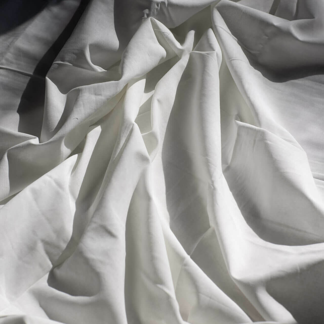 wrinkled sheet in white color.