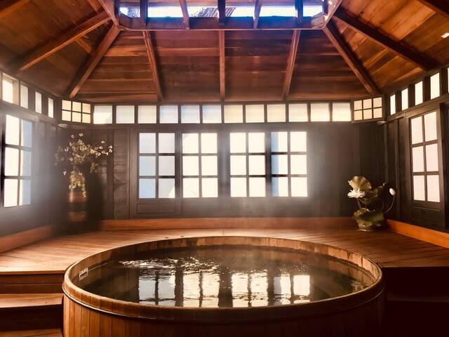hot wooden bath filled with steam